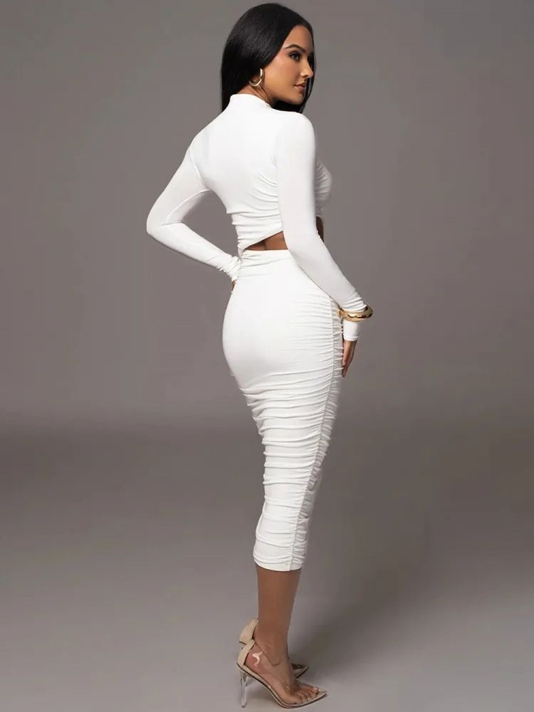 midi dress with cutouts, high collar and draped on the side of the hip